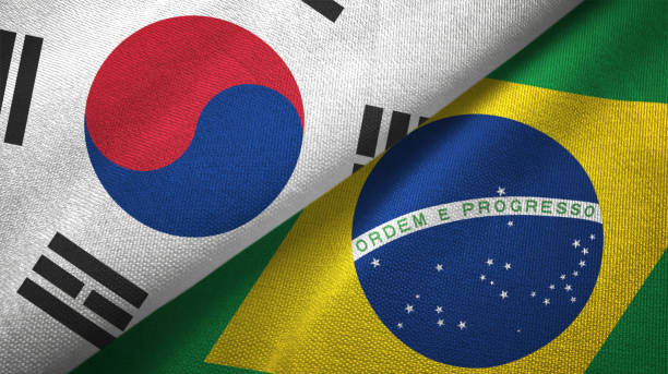istock Brazil and South Korea two flags together textile cloth fabric texture 1093227950