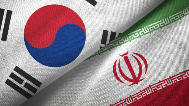 istock Iran and South Korea two flags together textile cloth fabric texture 1093228170