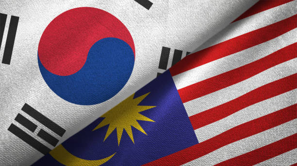 istock Malaysia and South Korea two flags together textile cloth fabric texture 1093229332