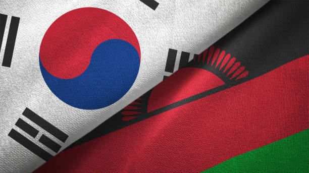 istock Malawi and South Korea two flags together textile cloth fabric texture 1093229340