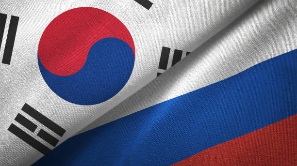 istock Russia and South Korea two flags together textile cloth fabric texture 1093229532