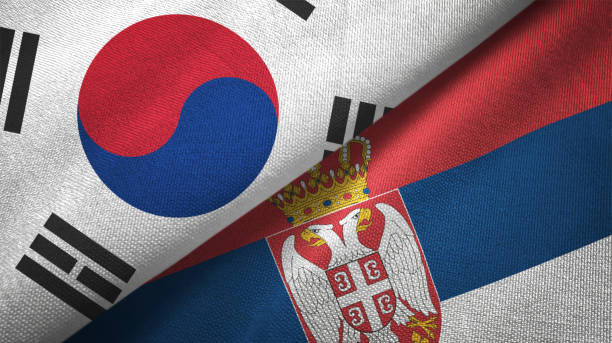 istock Serbia and South Korea two flags together textile cloth fabric texture 1093229544