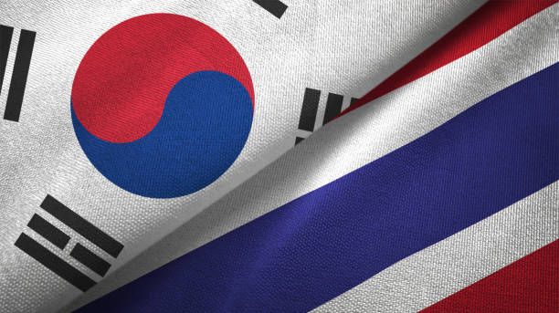 istock Thailand and South Korea two flags together textile cloth fabric texture 1093229694