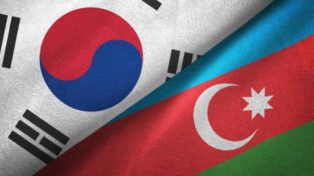 istock Azerbaijan and South Korea two flags together textile cloth fabric texture 1093229910