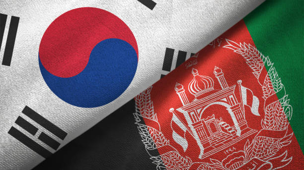 istock Afghanistan and South Korea two flags together textile cloth fabric texture 1093229942