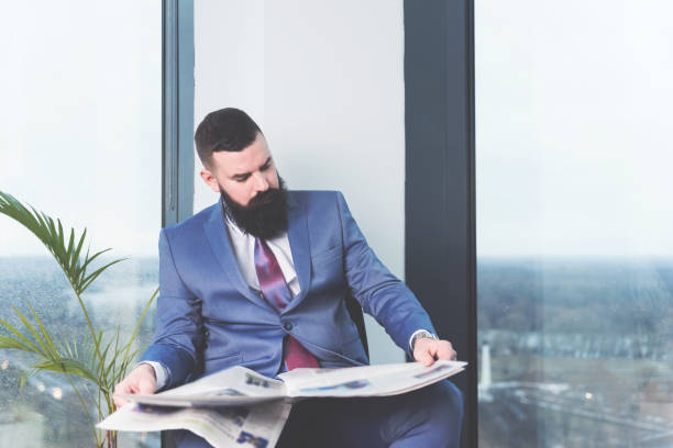 istock Manager reading business magazine 1093237854