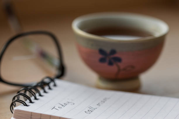 istock Notepad with Eyeglasses and Cup of Tea 1093245010