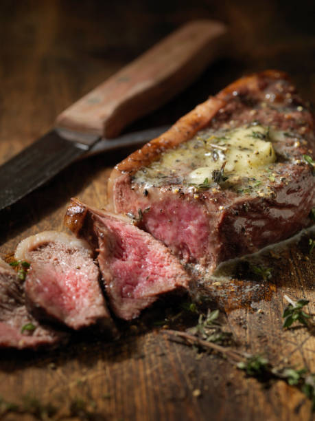 istock Medium Rare Top Sirloin Steak with Herb Garlic Butter 1093246080