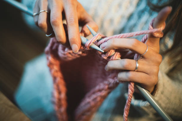 Close up on woman's hands knitting Close up on woman's hands knitting hand grenade photos stock pictures, royalty-free photos & images