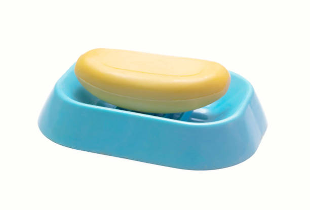 istock Yellow soap on a blue soap dish 1093252366