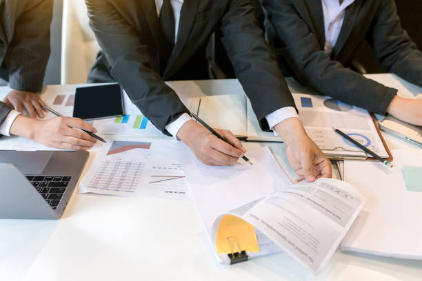 istock Teamwork process, business people working in the office discussing documents and ideas at meeting. 1093255856