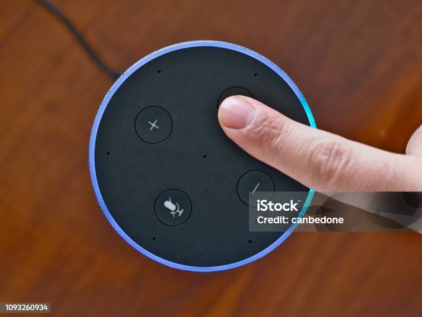Smart Speaker Top View Artificial Intelligence Assistant Voice Control Blue Ring Stock Photo - Download Image Now