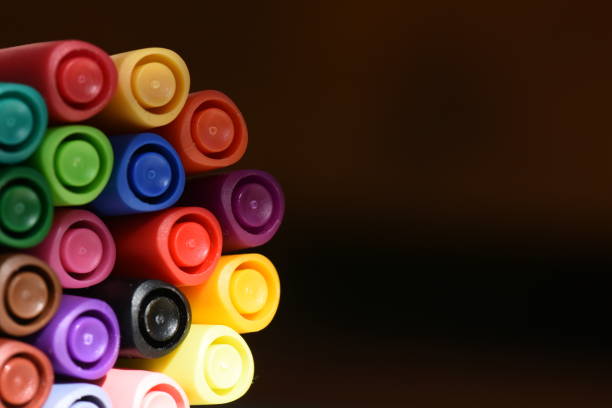 istock Set of colored markers Against a black background 1093262664