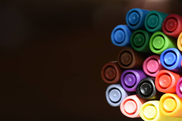 istock Set of colored markers Against a black background 1093262666