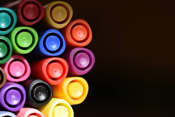 istock Set of colored markers Against a black background 1093262962