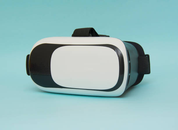 istock Virtual reality helmet isolated on blue background 1093265818