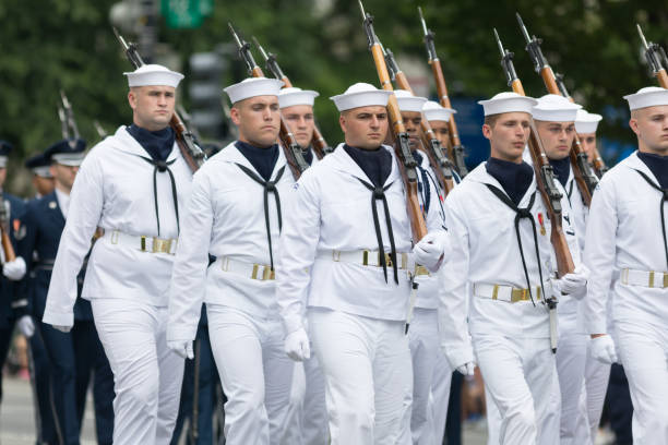 Annapolis, Maryland, USA - July 18, 2015: Plebes in noon formation at Tecumseh Court at the Navy Academy in Annapolis, Maryland