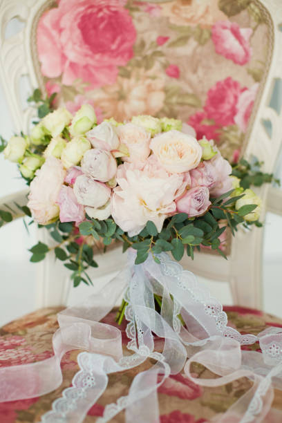 istock wedding bouquet on a chair 1093274258