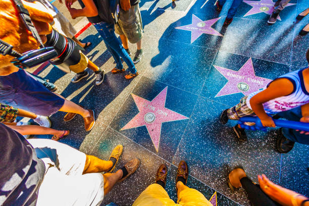 Elton Johns star on Hollywood Walk of Fame HOLLYWOOD, USA - JUNE 24, 2012: Elton Johns star on Hollywood Walk of Fame   in Hollywood, California. This star is located on Hollywood Blvd. and is one of 2400 celebrity stars. johns stock pictures, royalty-free photos & images
