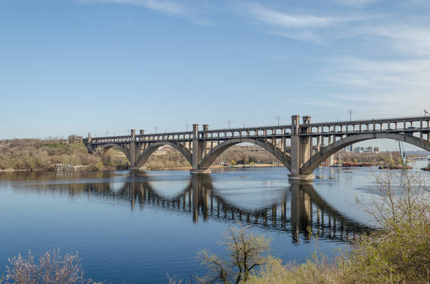 istock A long, Soviet-built road bridge across the river. 1093280866