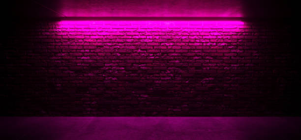 istock Empty Neon Glowing Pink Purple Light On Grunge Vibrant Brick Wall Empty For Text And Concrete Floor Dark Room Club Stage Showroom Retro Elegant 3D Rendering 1093280906