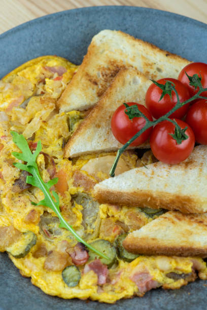 istock Omelette with pork crisps and torshi, vegetables 1093283816