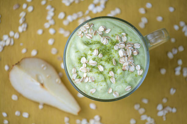 Healthy smoothie with pear, avocado and oats