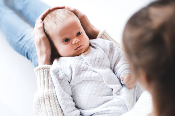 istock Mother holding baby boy 1093287384