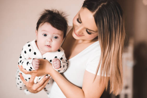 istock Baby with mother 1093287426