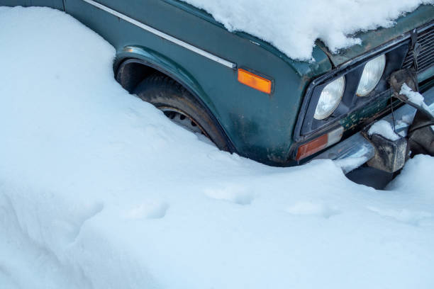 istock old soviet broken and abandoned car in the snow 1093292294