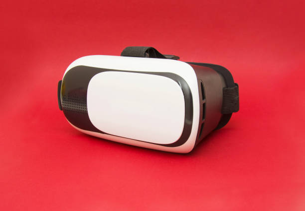 Virtual reality helmet isolated on red background