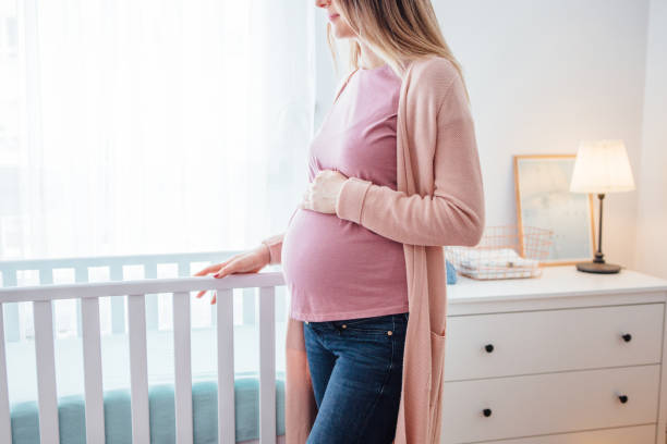 istock Mother in baby room 1093297156