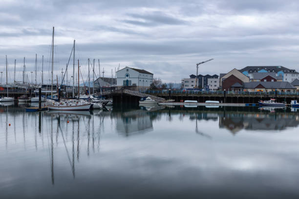 istock Carrickfergus Harbour with boats and reflection 1093300154