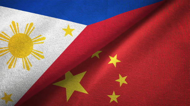 istock China and Philippines two flags together textile cloth fabric texture 1093302942