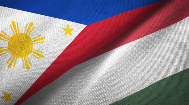 istock Hungary and Philippines two flags together textile cloth fabric texture 1093304280