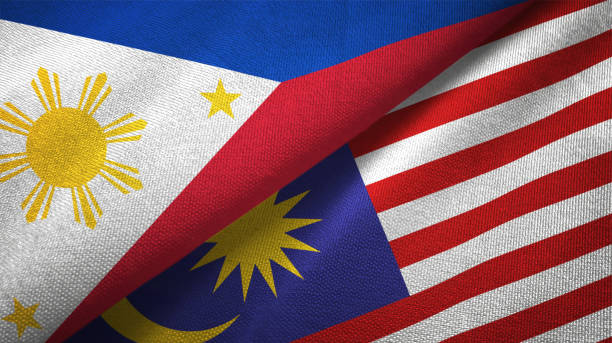 istock Malaysia and Philippines two flags together textile cloth fabric texture 1093304572