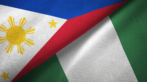 istock Nigeria and Philippines two flags together textile cloth fabric texture 1093304730