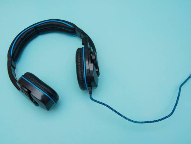 istock Headphones isolated on the blue background 1093306724