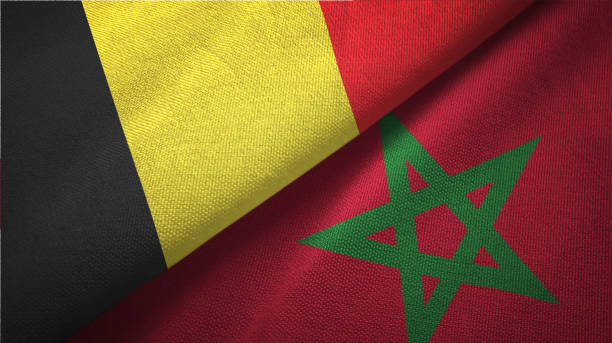 istock Morocco and Belgium two flags together textile cloth fabric texture 1093307726