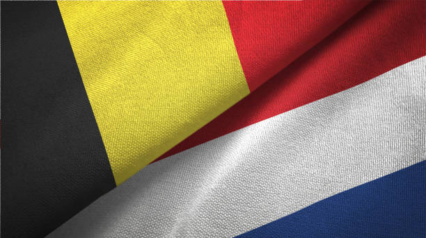 istock Netherlands and Belgium two flags together textile cloth fabric texture 1093307786