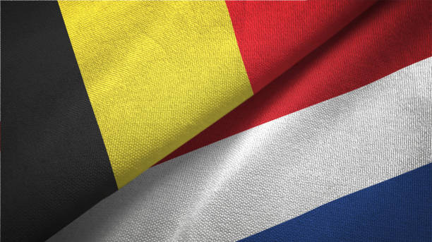 Netherlands and Belgium two flags together textile cloth fabric texture Netherlands and Belgium flag together realtions textile cloth fabric texture belgium stock pictures, royalty-free photos & images