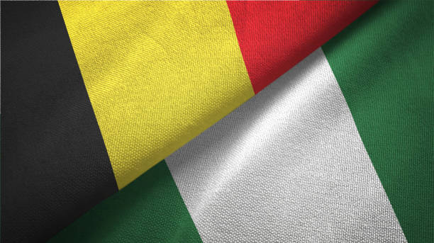 istock Nigeria and Belgium two flags together textile cloth fabric texture 1093307792