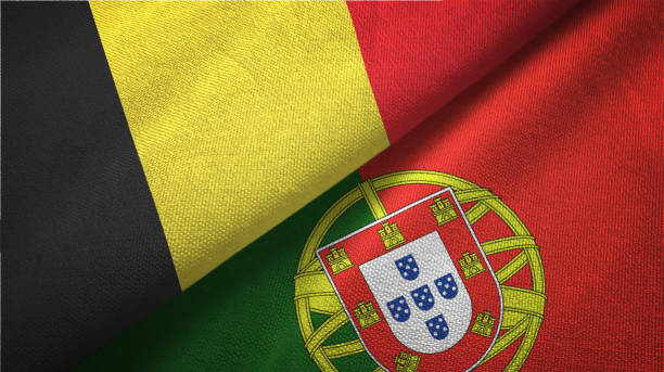 istock Portugal and Belgium two flags together textile cloth fabric texture 1093308894