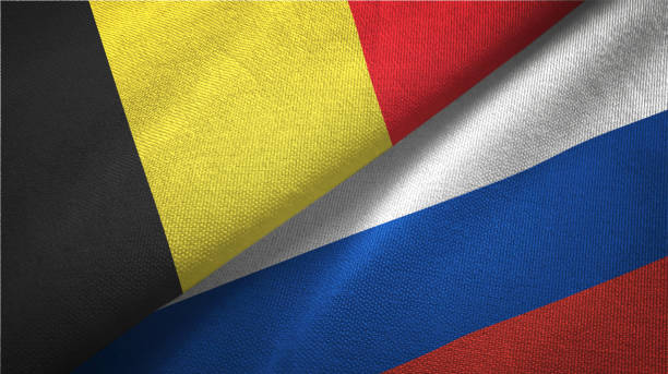 istock Russia and Belgium two flags together textile cloth fabric texture 1093308910