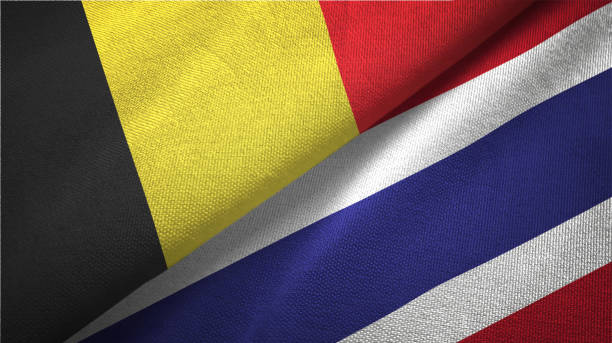 istock Thailand and Belgium two flags together textile cloth fabric texture 1093309104