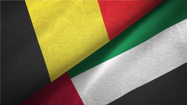 istock United Arab Emirates and Belgium two flags together textile cloth fabric texture 1093309120