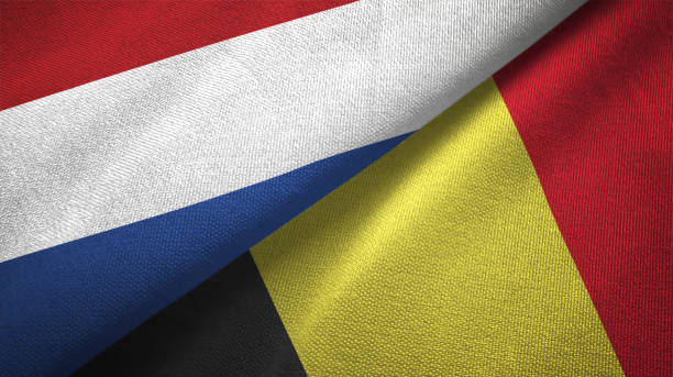 istock Belgium and Netherlands two flags together textile cloth fabric texture 1093316856