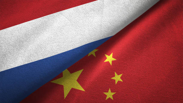 istock China and Netherlands two flags together textile cloth fabric texture 1093316996