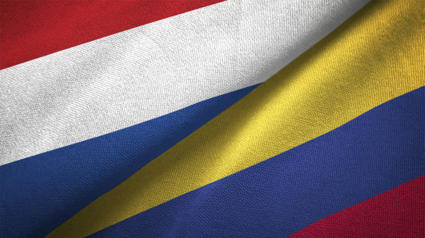 istock Colombia and Netherlands two flags together textile cloth fabric texture 1093317006