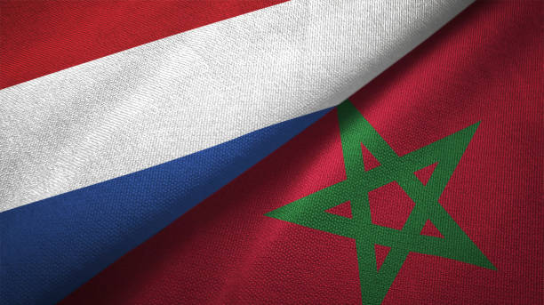 istock Morocco and Netherlands two flags together textile cloth fabric texture 1093317620